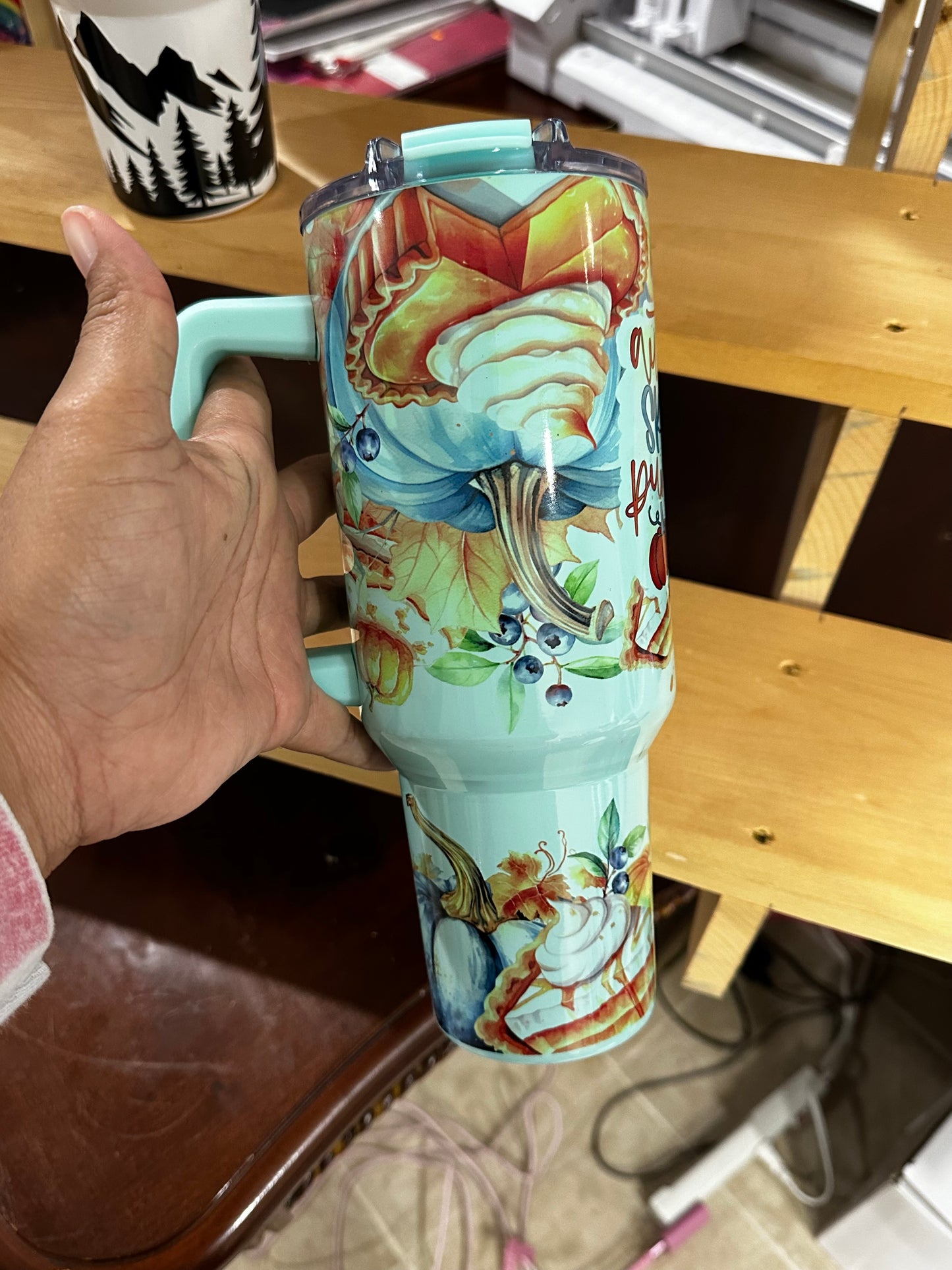 Turquoise colored 40 oz Tumbler.